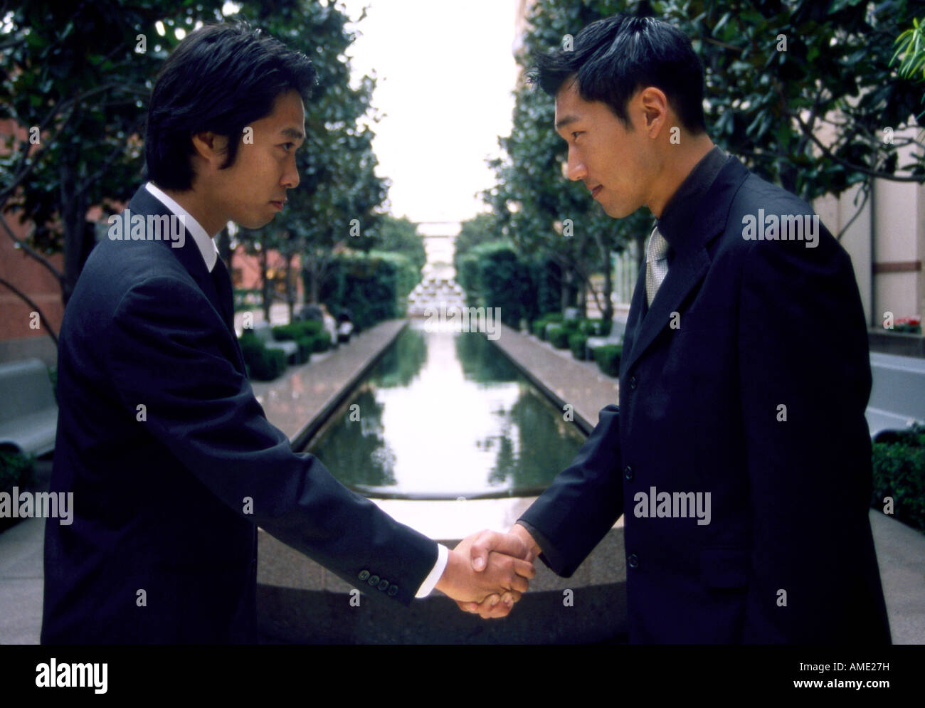 Japanese Businessmen Shaking Hands Stock Photo Alamy