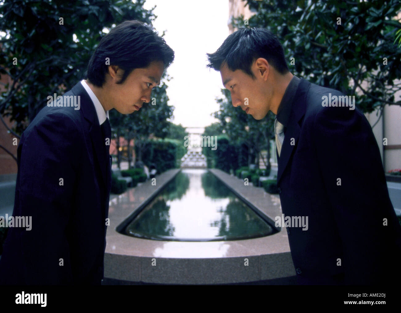 Japanese Businessmen Bowing Stock Photo