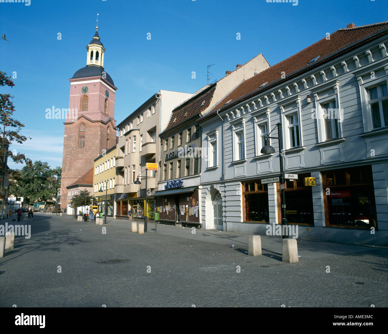 A part of the old town of Spandau the tower of the Baroque neo Gothic St Nikolai Church in the distance Stock Photo