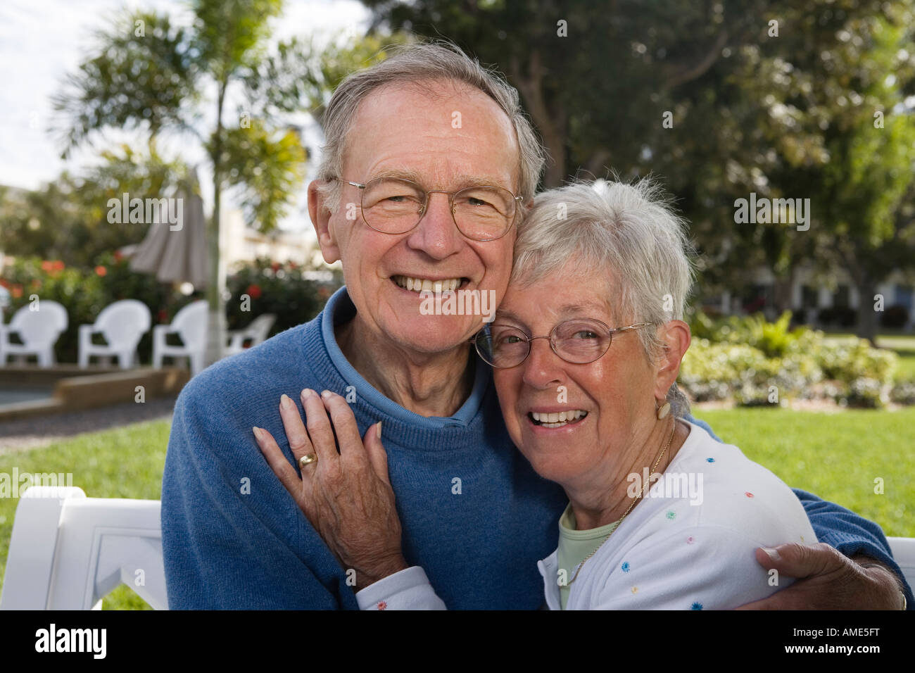 Portrait of a senior couple in a park Stock Photo - Alamy
