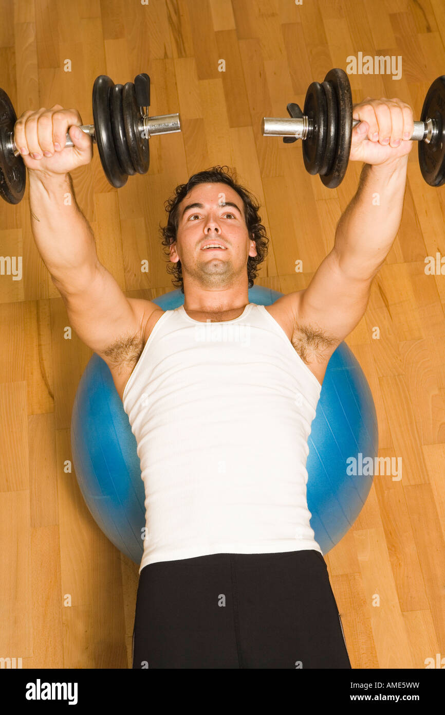 man weight training at home Stock Photo - Alamy