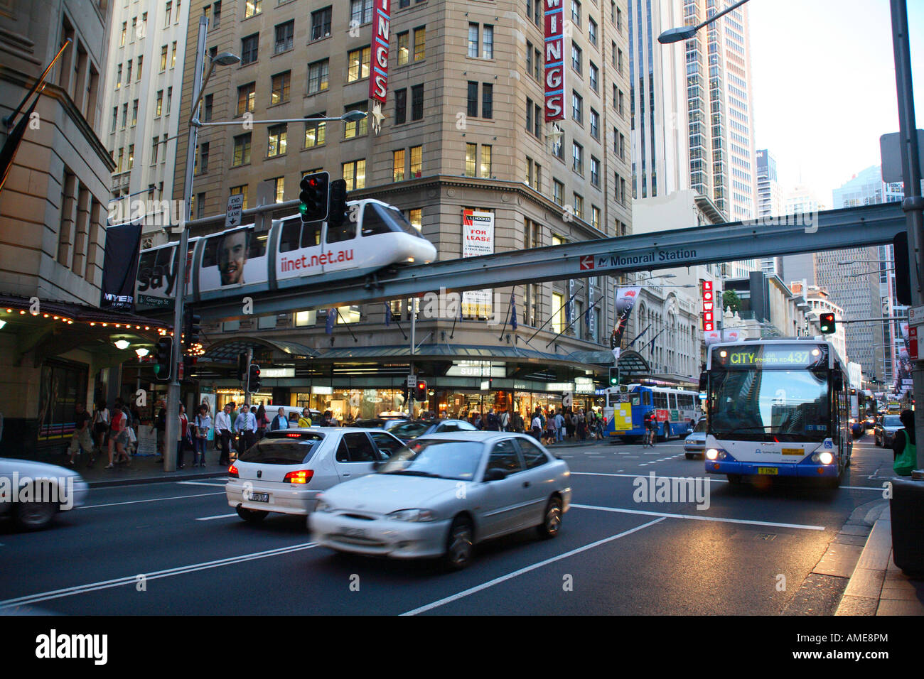 Sydney Monorail passing over traffic on George Street Sydney New South Wales Australia Stock Photo