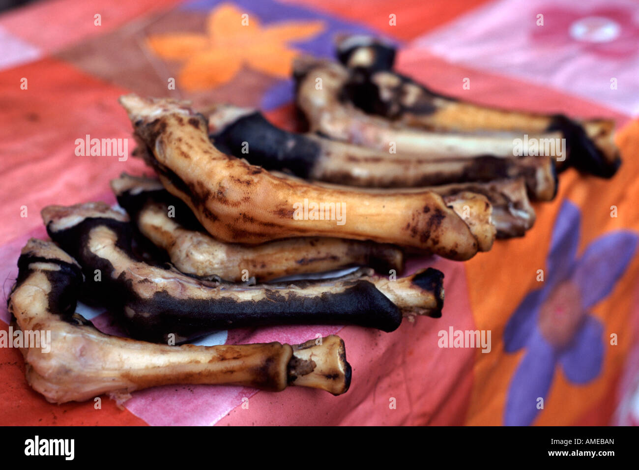 Unidentified animal legs for sale in the market in Marrakech, Morocco. Stock Photo