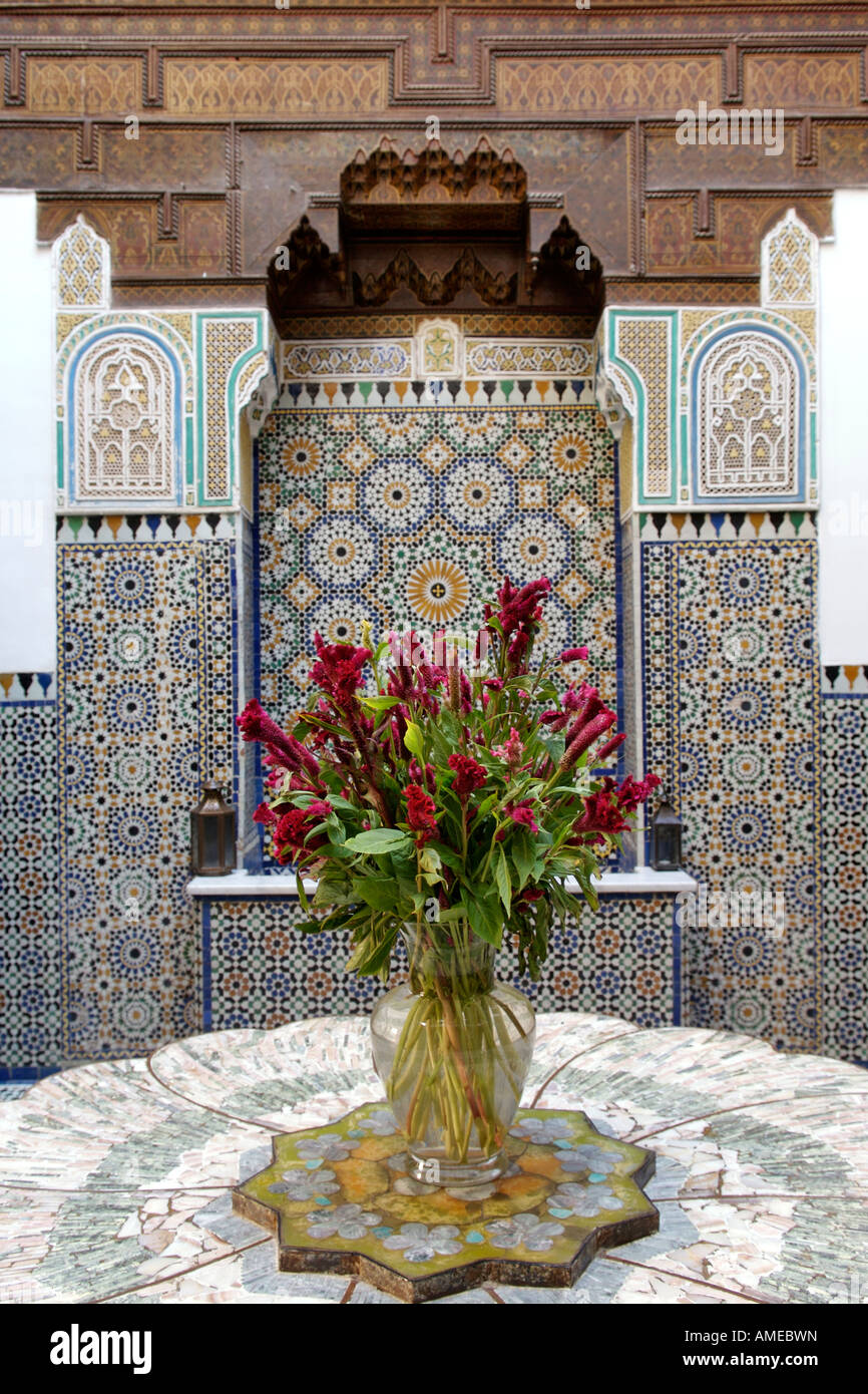 Flower arrangement in the entrance hall of the Palais Sebban riad in Marrakech, Morocco. Stock Photo