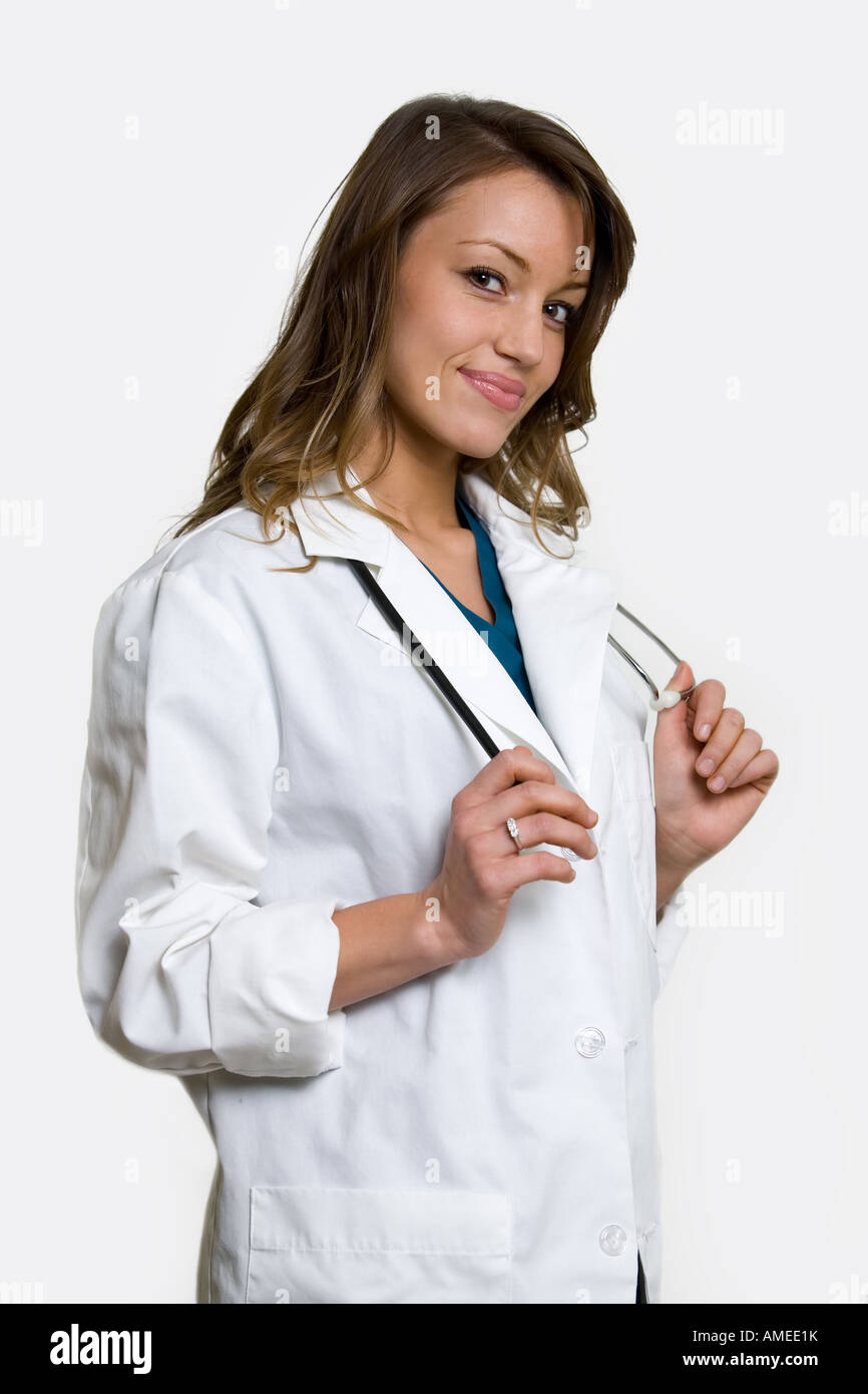 Female attractive doctor wearing white lab coat with a
