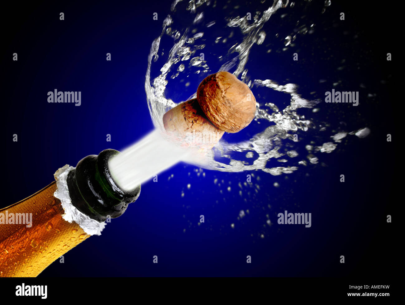 Close up of champagne cork popping Stock Photo Alamy