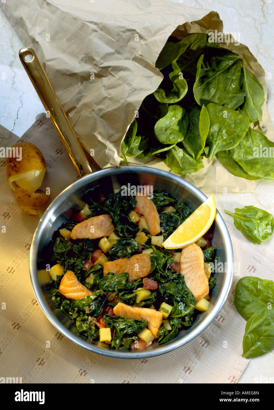 spinach with pieces of salmon Stock Photo - Alamy