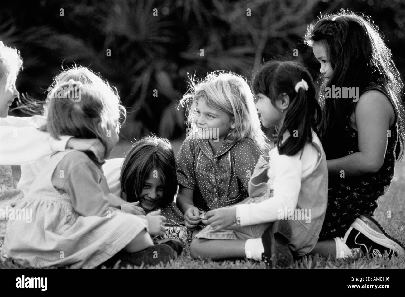 Group of Girls Talking Outdoors Stock Photo