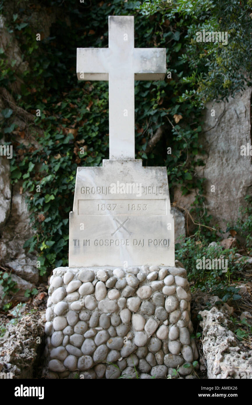 Cross in the cave below Sveti Nikola peak in Sveta Nedjelja village Hvar Island Stock Photo