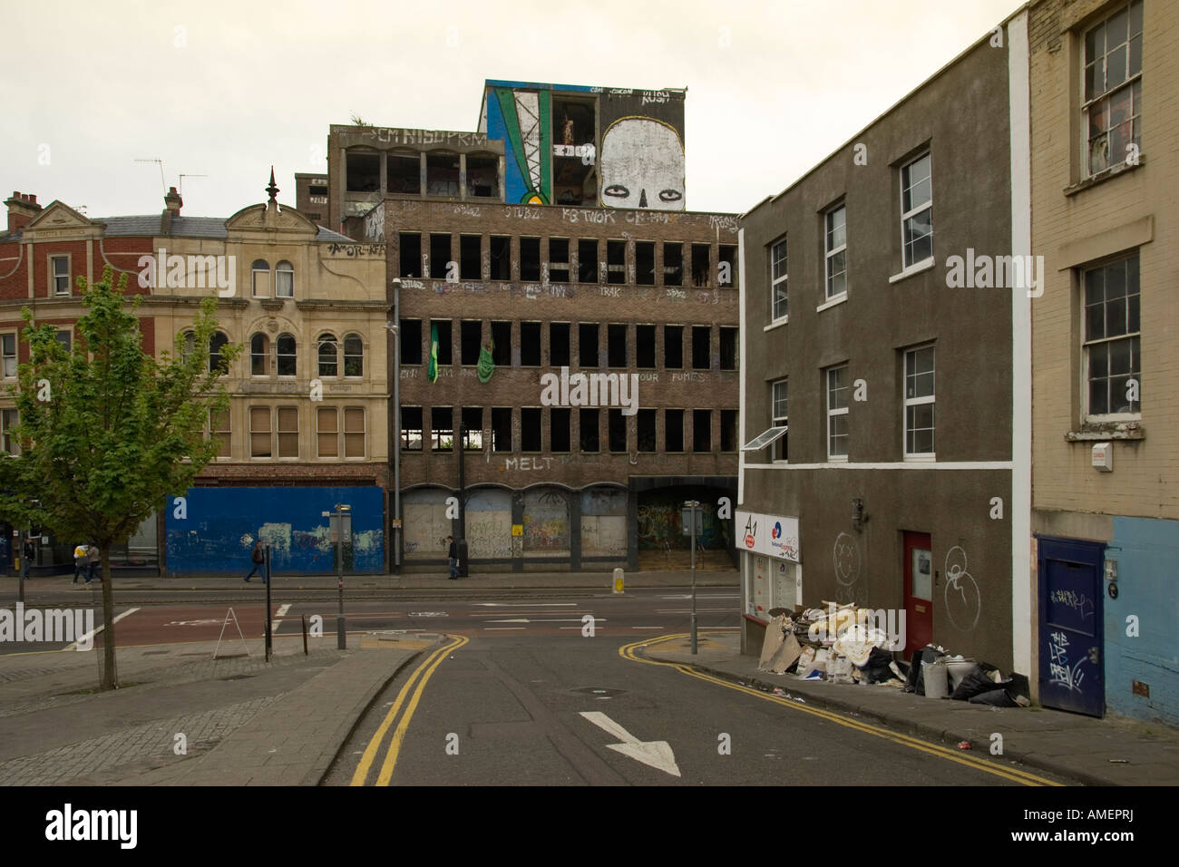 View down Nine Tree Hill to Cheltenham Road, showing urban graffiti. Bristol, England, UK