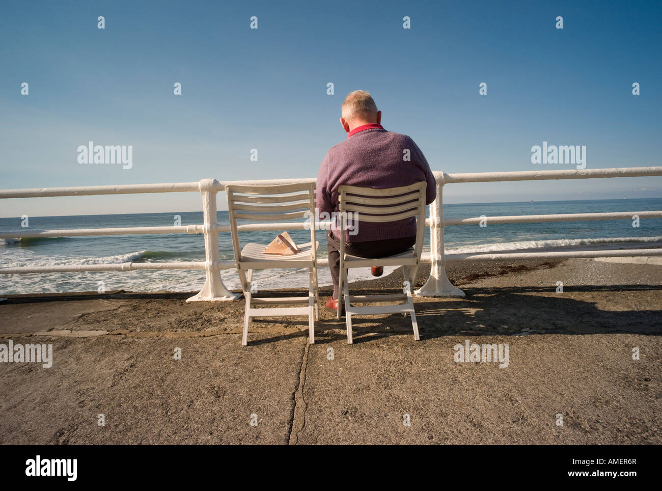 Old man sitting empty chair hires stock photography and images Alamy