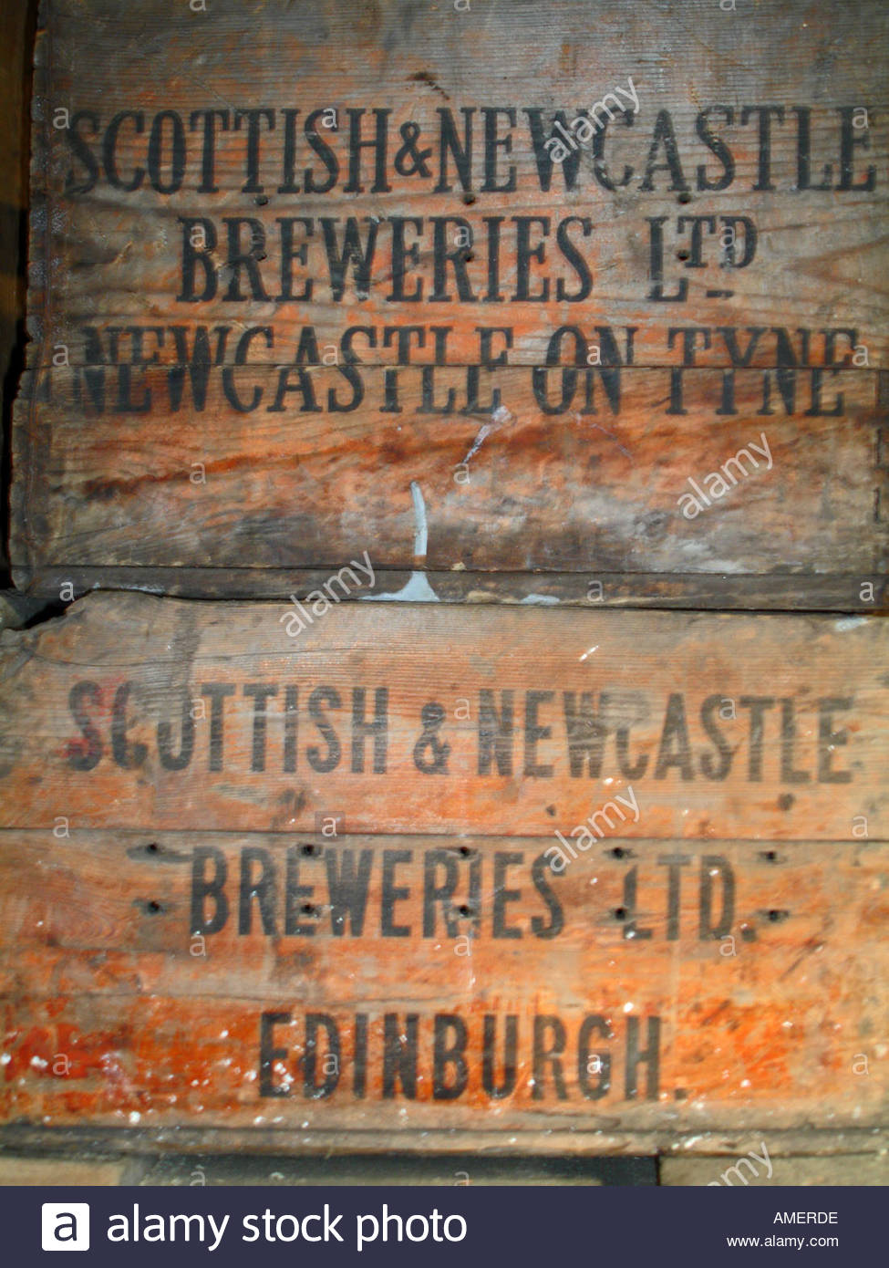 Old storage crates from Scottish and Newcastle brewery Stock Photo