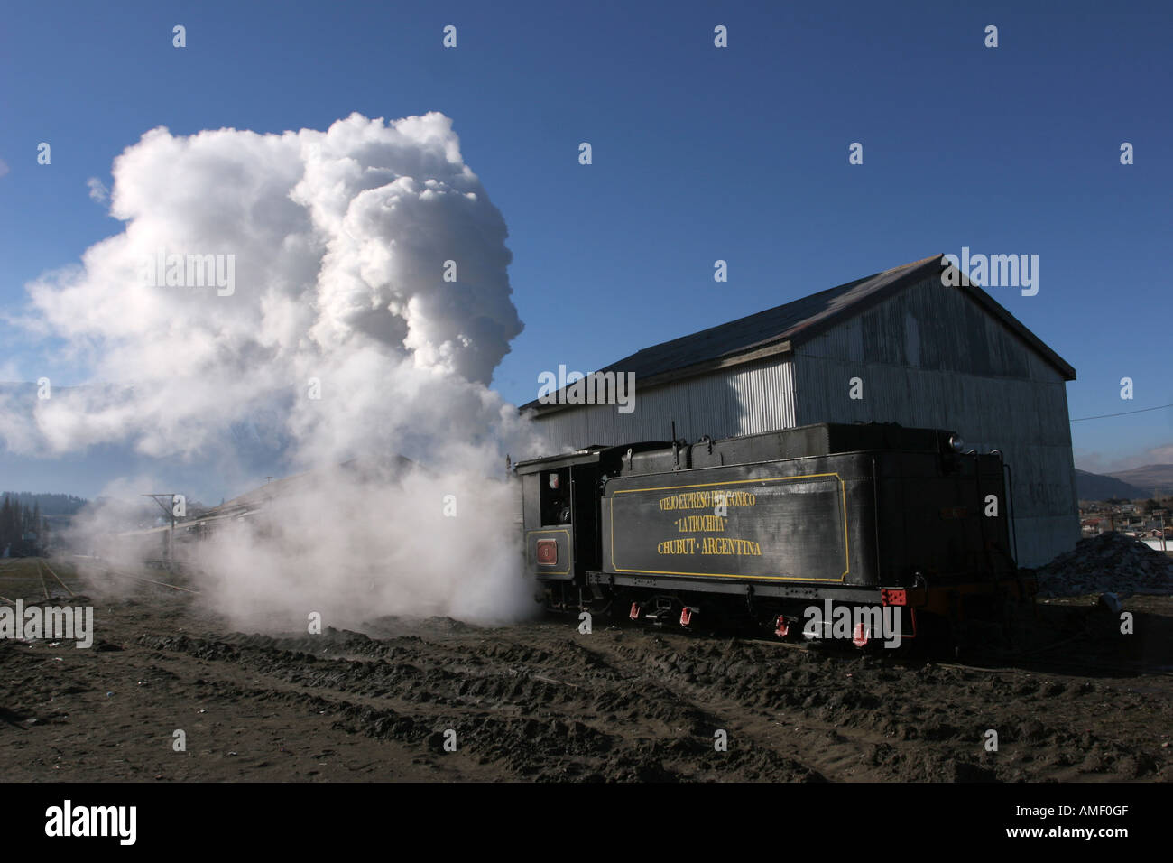 Old steam train locomotive La Trochita leaving the station of the town of Esquel, Chubut, Patagonia, Argentina. Stock Photo