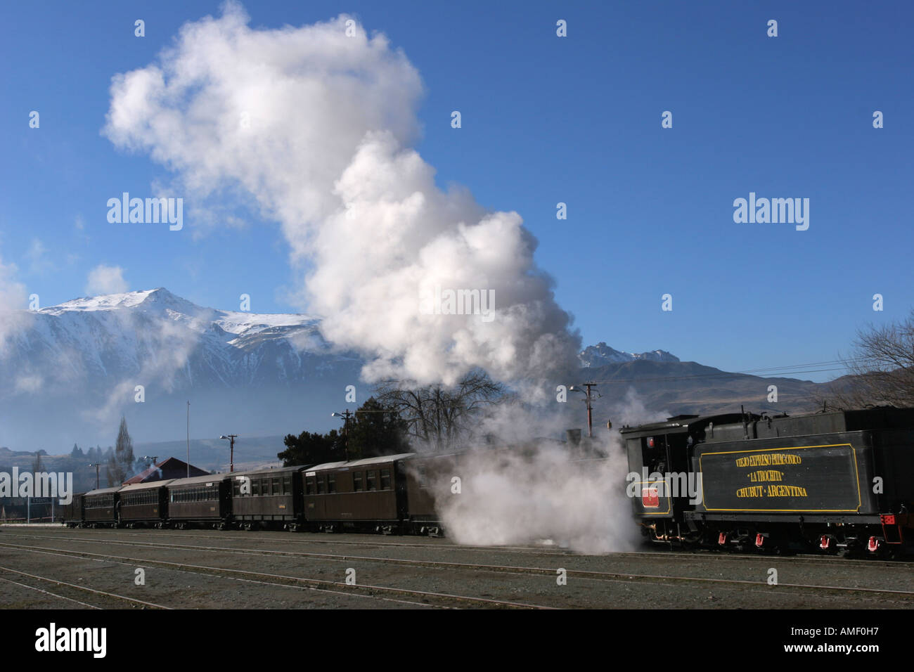 Old steam train La Trochita leaving the station of the town of Esquel, Chubut, Patagonia, Argentina. Stock Photo