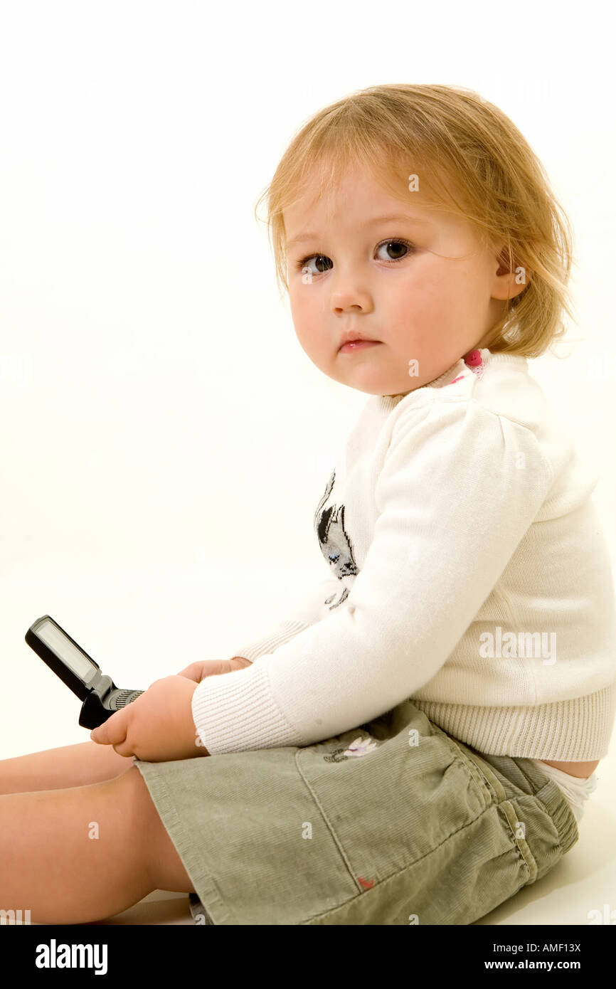 Baby texting Stock Photo