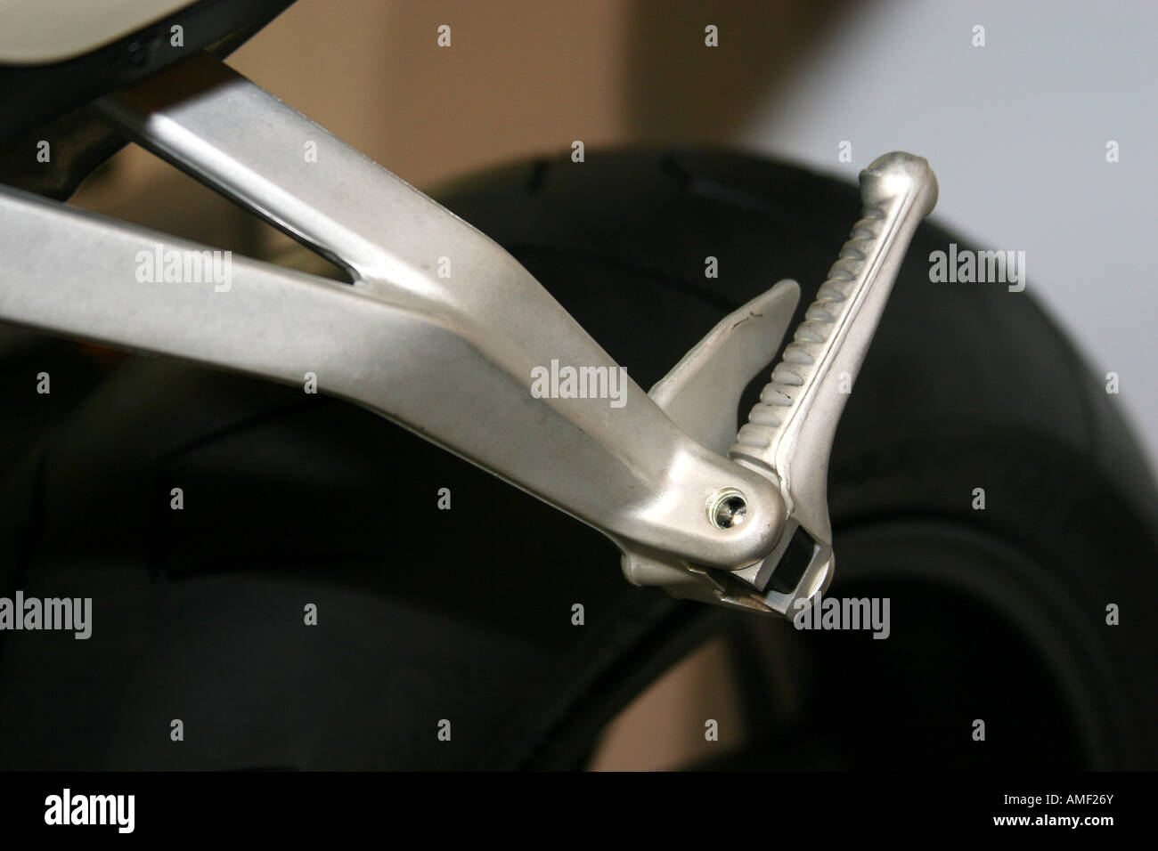 Alloy rear foot rest on modern motor cycle Stock Photo Alamy
