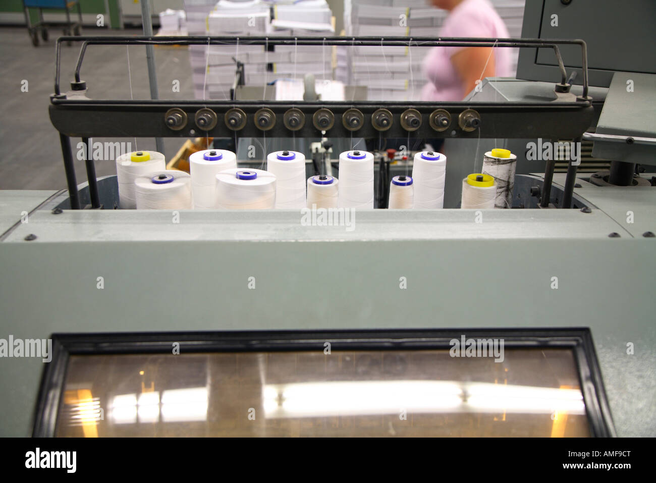 Bookbindery, binding books company. Bindery bindings of magazines Stock