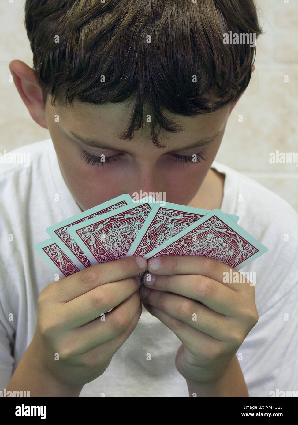 Young Boy Playing Cards Stock Photo Alamy