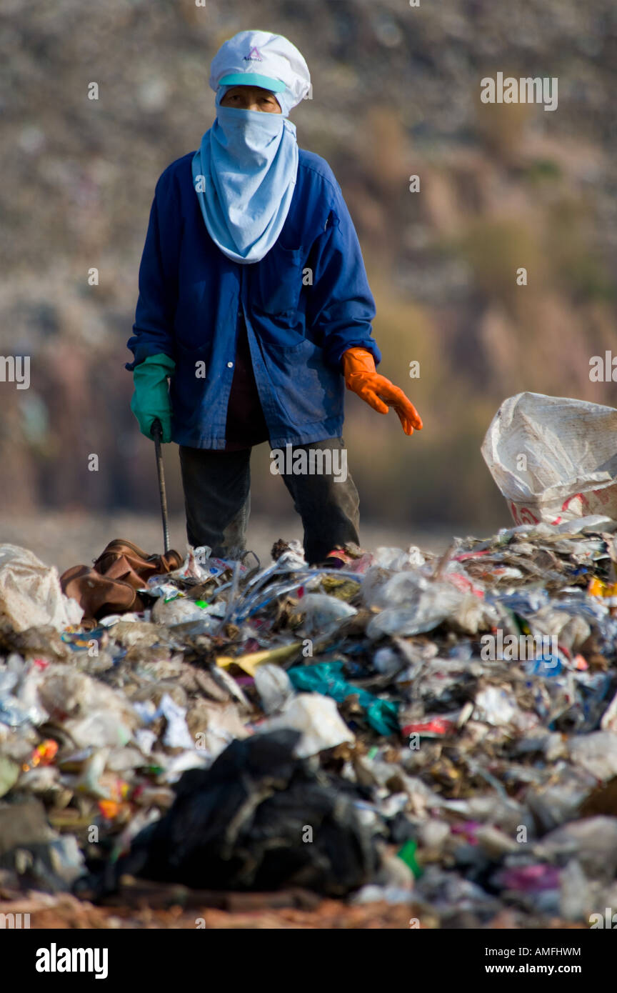 The poor hand sorting waste for recycling at a landfill site in Thailand Stock Photo Alamy