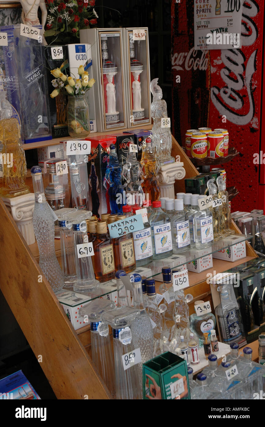 Ouzo and Metaxa bottles on display outside a shop in Rhodes in Greece