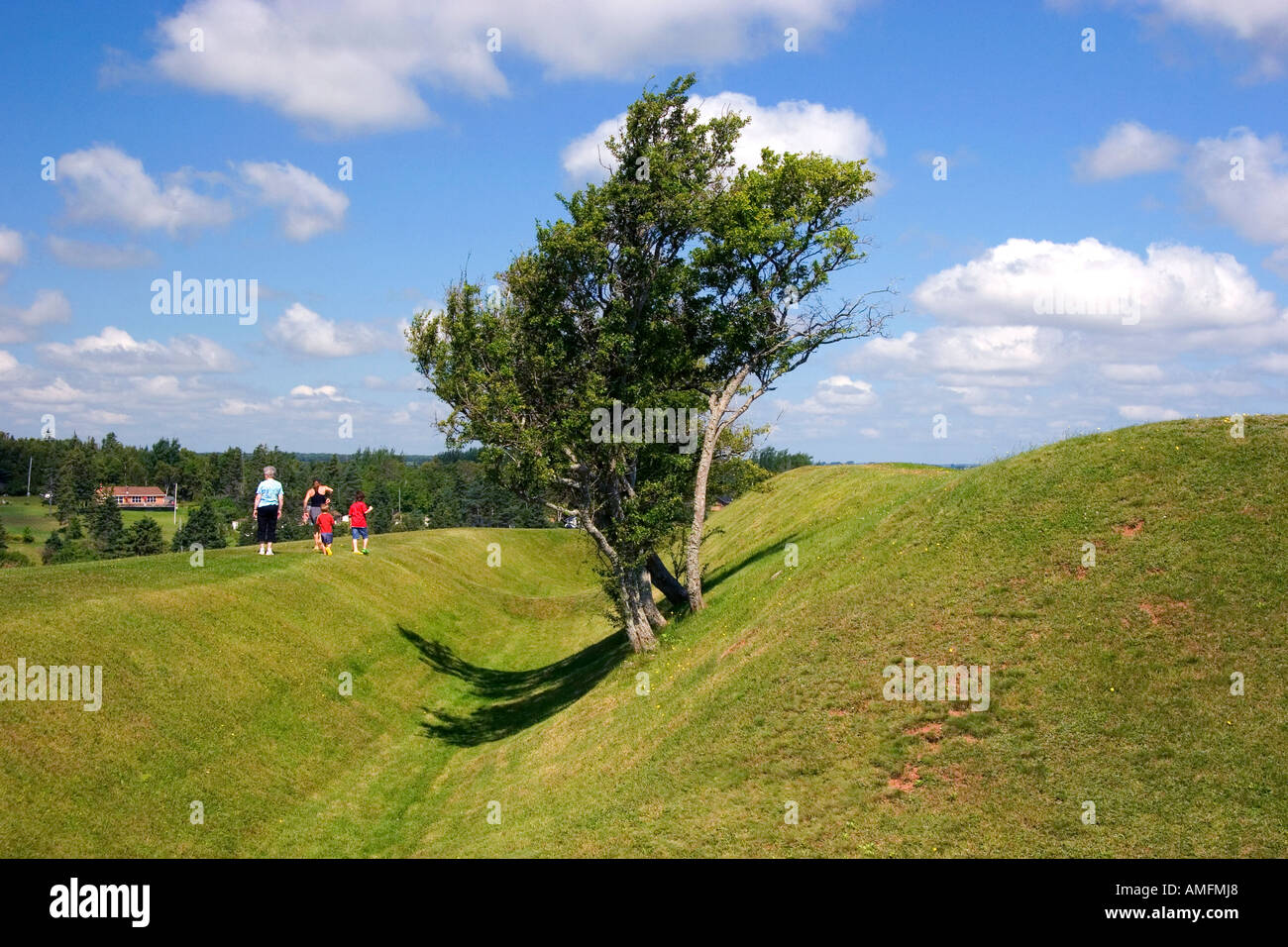 Hikers on a trail at Ft. Amherst near Charlottetown on Prince Edward Island, Canada. Stock Photo
