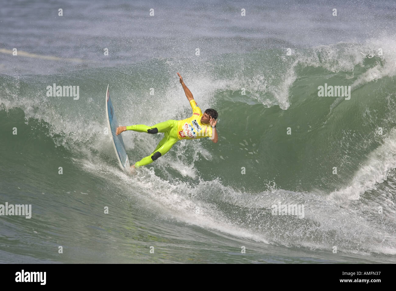 Surfer riding a Wave Stock Photo - Alamy