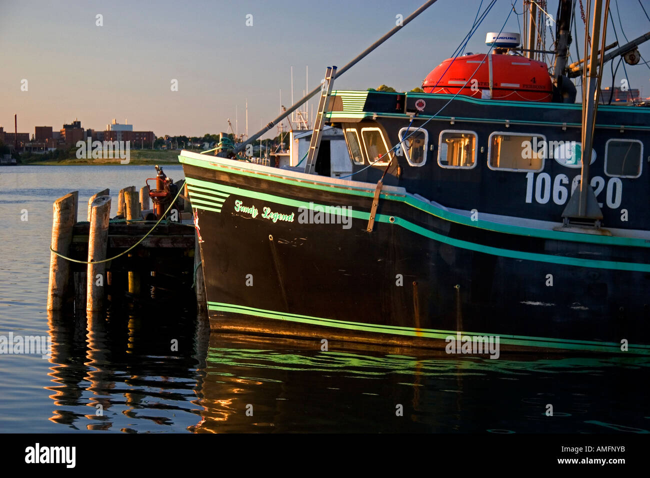 Fishing boat at sunset docked at Yarmouth, Nova Scotia, Canada Stock