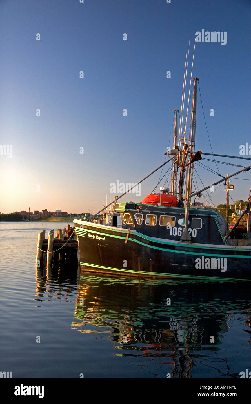 Fishing boat at sunset docked at Yarmouth, Nova Scotia, Canada Stock