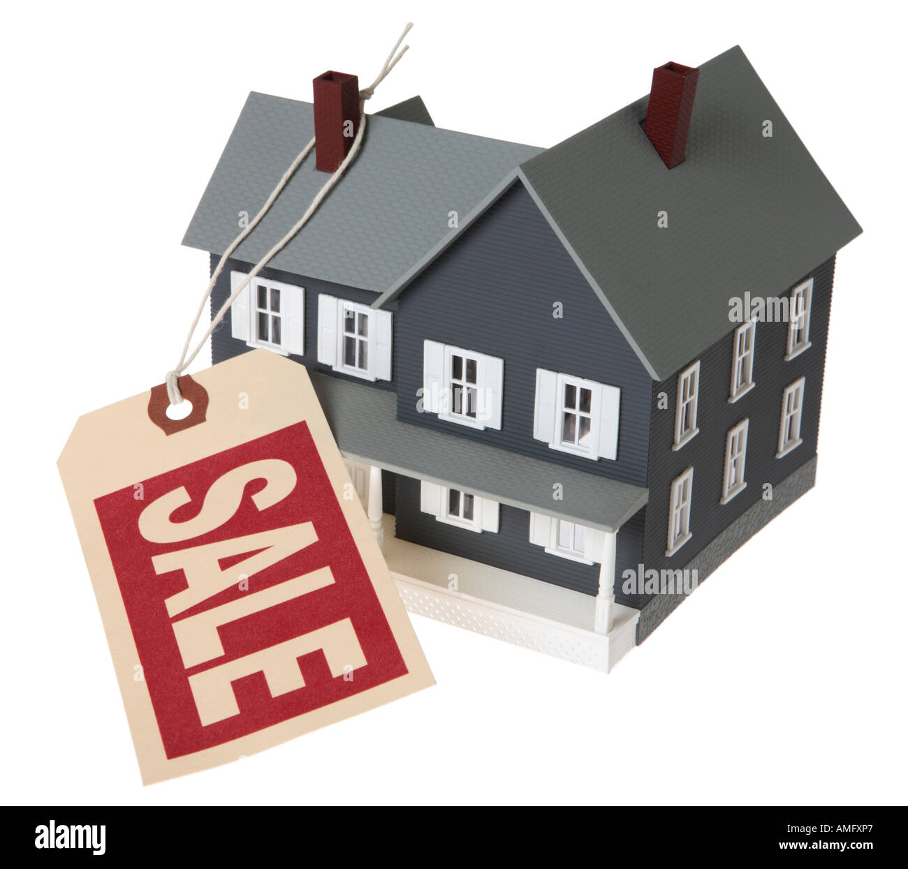 House with Sale Tag Stock Photo