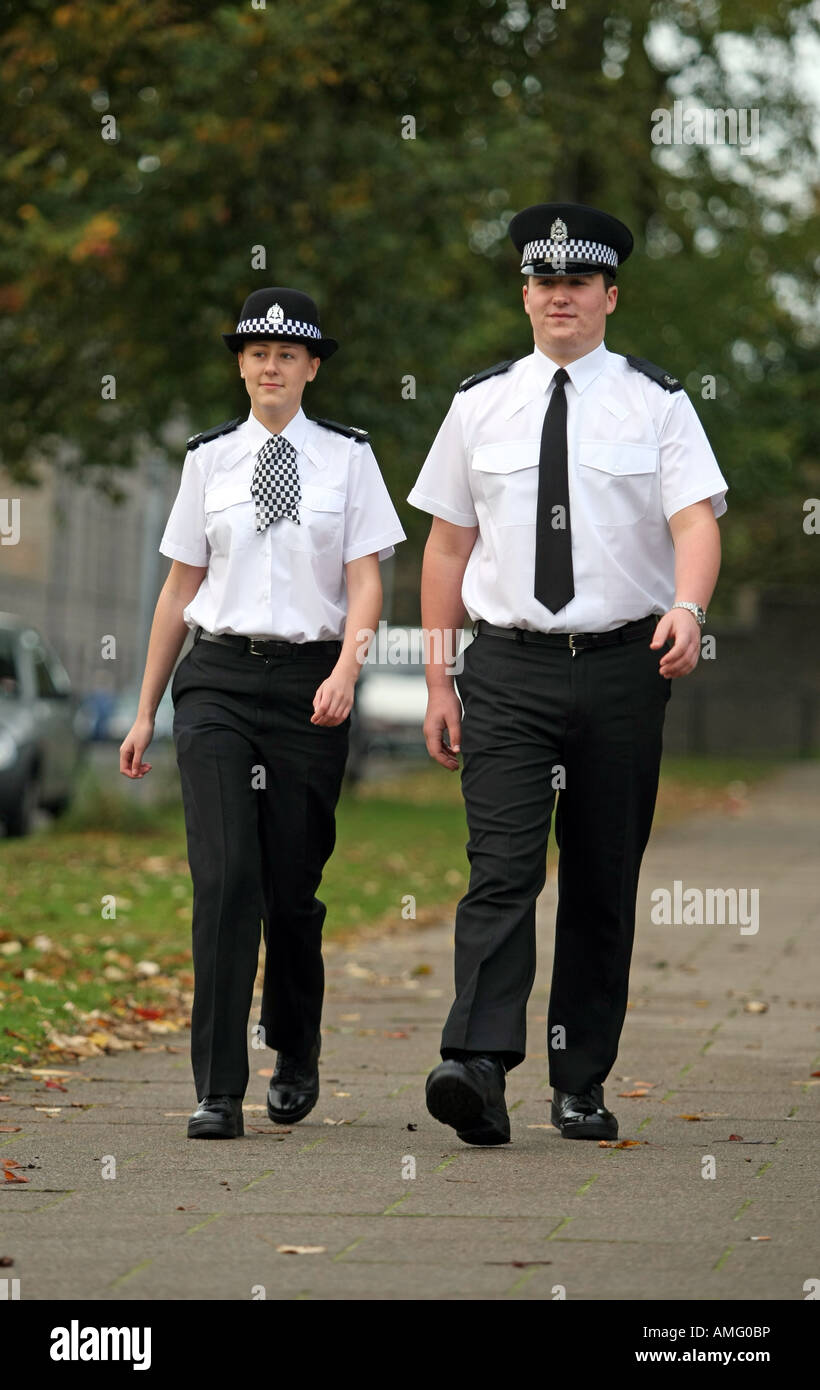 A young male and female probationer police officer for Grampian Police based in Aberdeen, Scotland, Uk Stock Photo