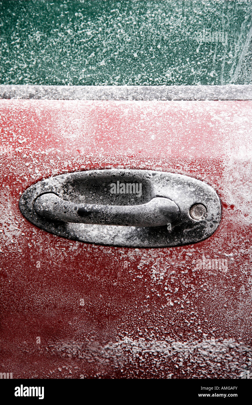 Frozen car after a winter blizzard with copy space for text Stock Photo