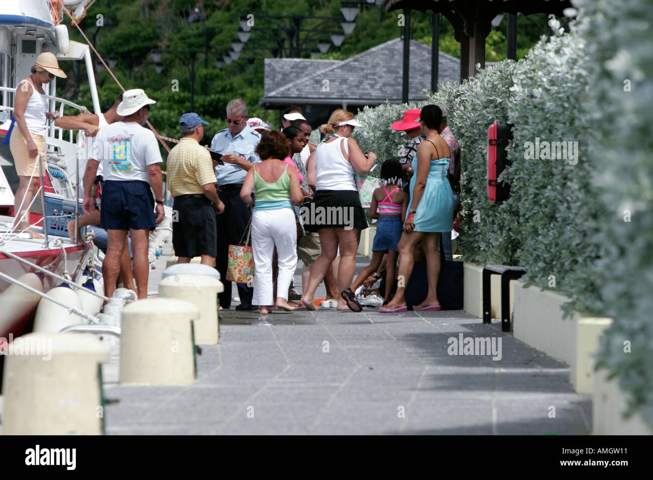 French immigration officer checks passports of ferry passengers