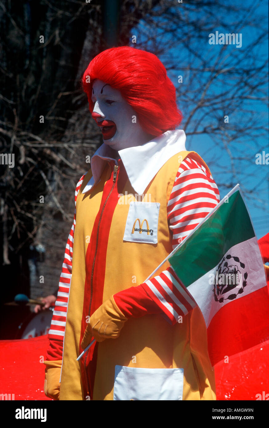 Ronald McDonald with Mexican flag. Stock Photo