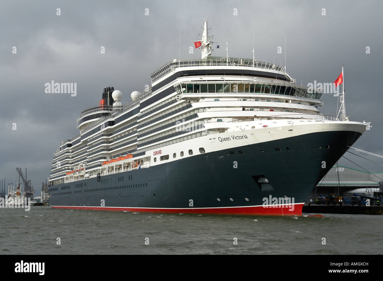 Queen Victoria at Berth 101 in Southampton harbour viewed from Mayflower Park Stock Photo