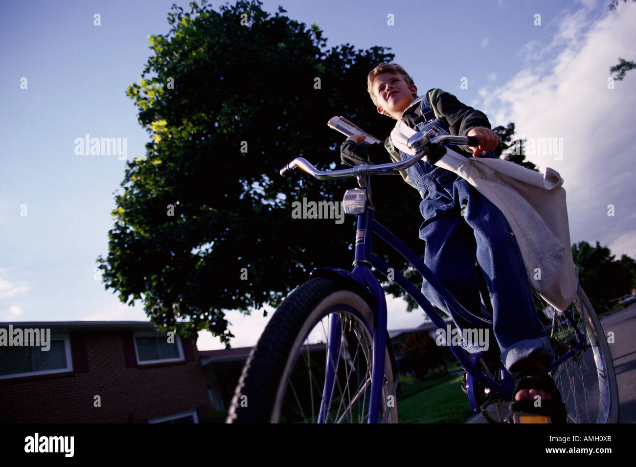 Newspaper delivery bike hires stock photography and images Alamy