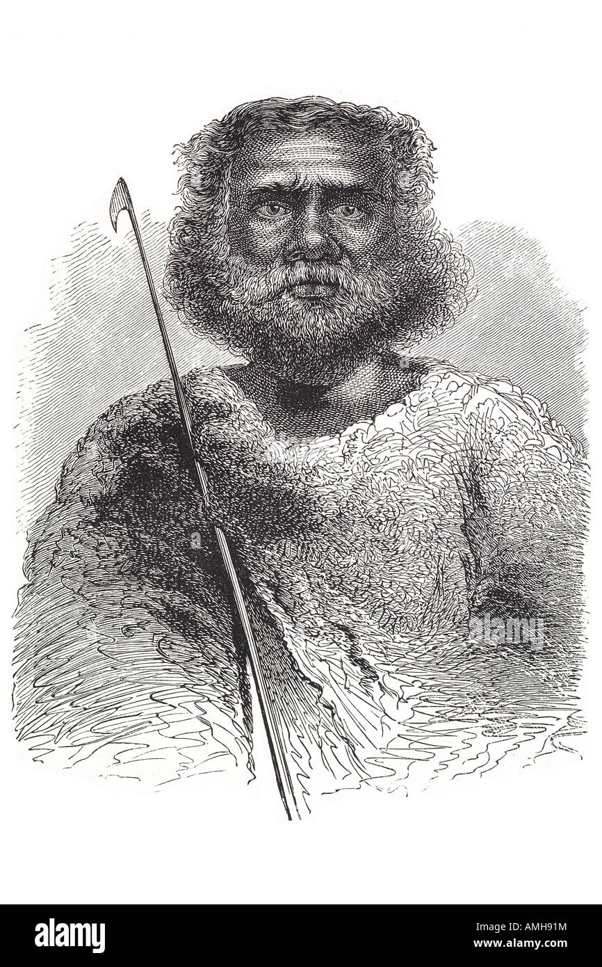 native australian costume native traditional ethnic dress outfit style pose hunter hunt  man male beard Australia face on strait Stock Photo