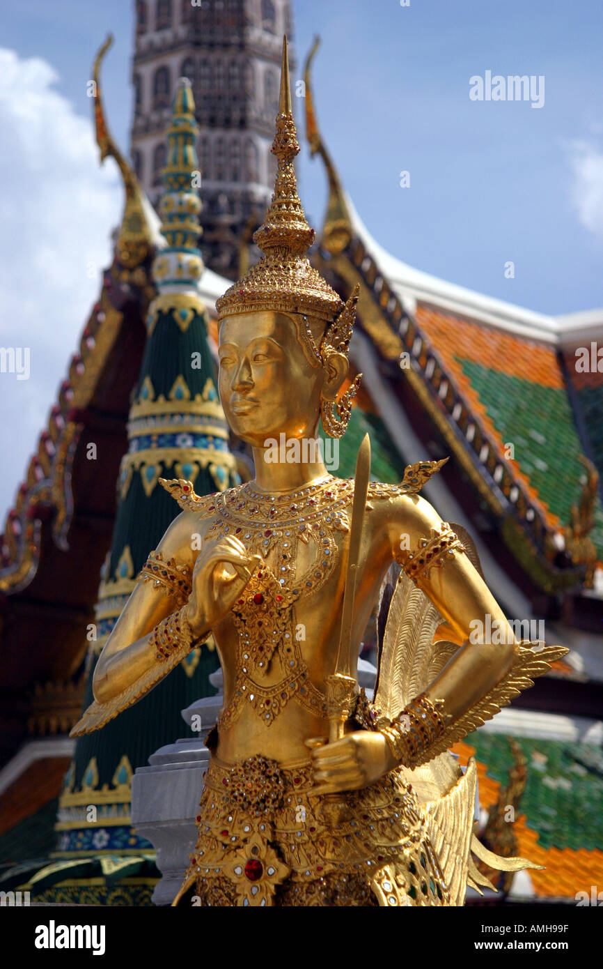 Gold statue at the Wat Phra Kaew temple Grand Palace Bangkok Thailand Stock Photo