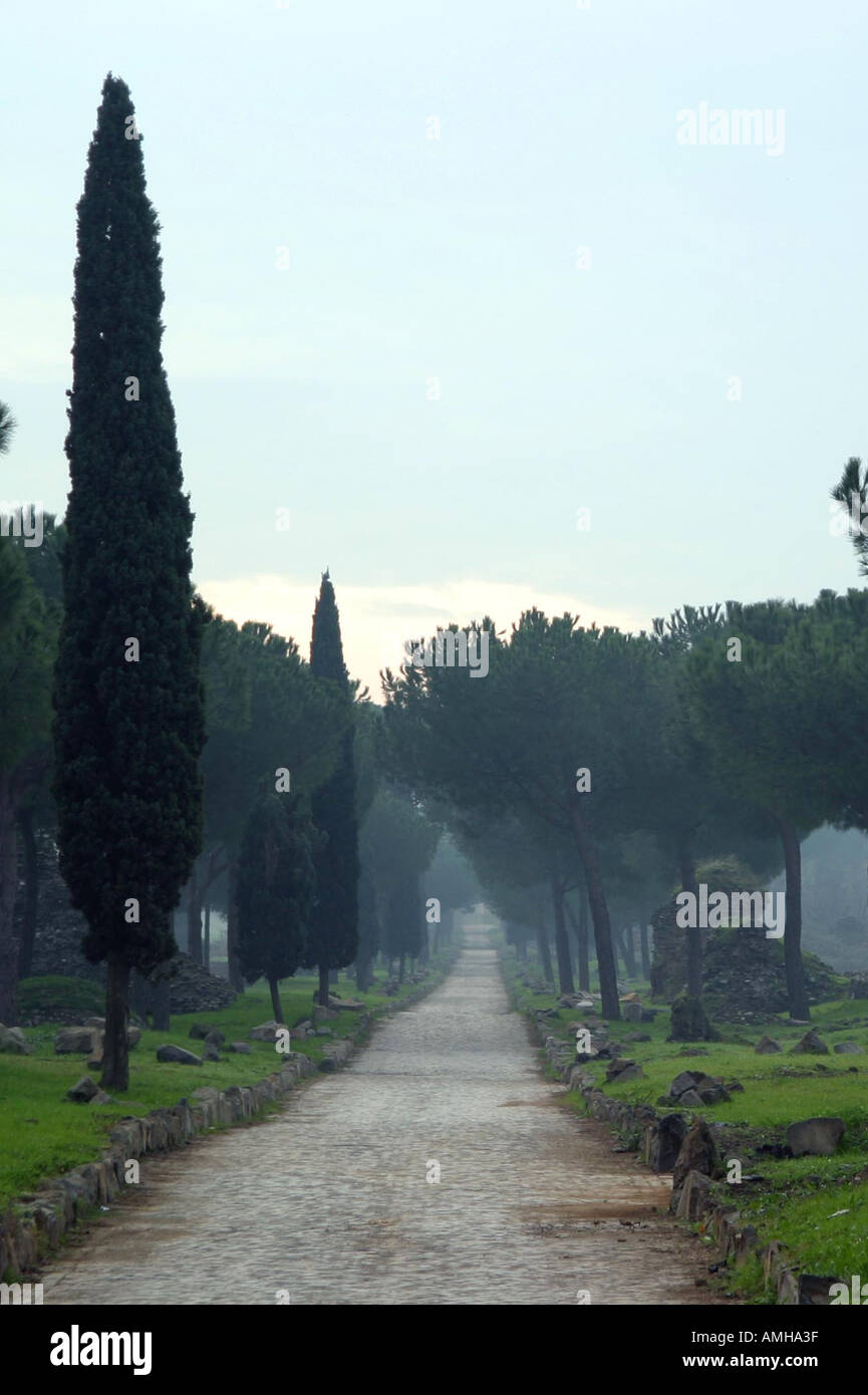 An old roman road named Via Appia Antica in Rome Italy Stock Photo