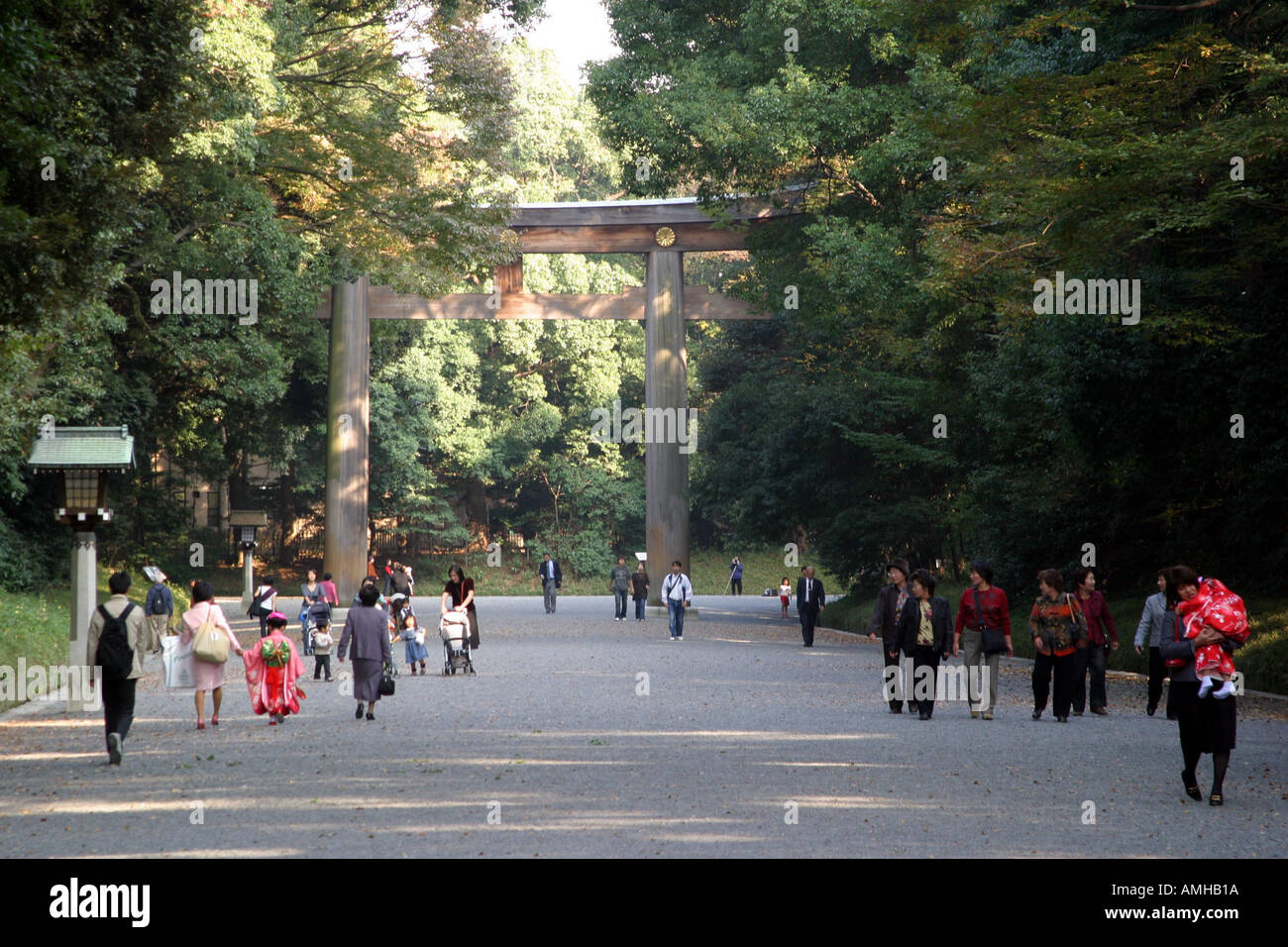 people walking in yoyogi koen park Tokyo Japan Stock Photo