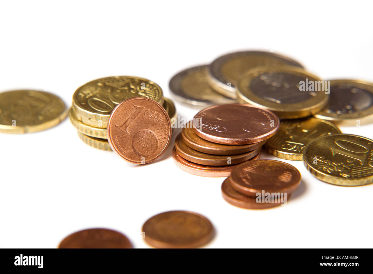 close-up of various european currency coins on white background Stock Photo