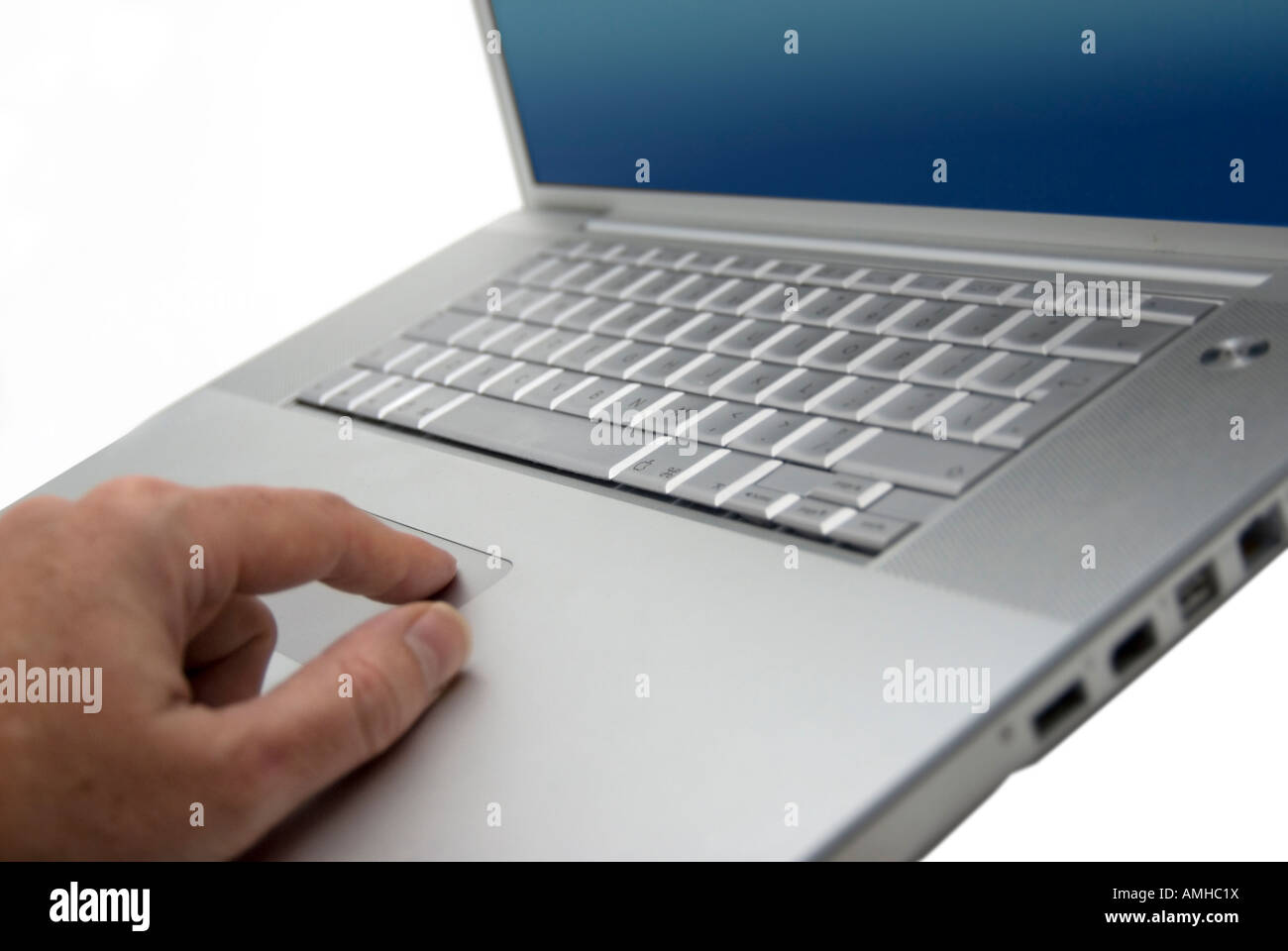 hand using mouse pad on a laptop computer Stock Photo Alamy