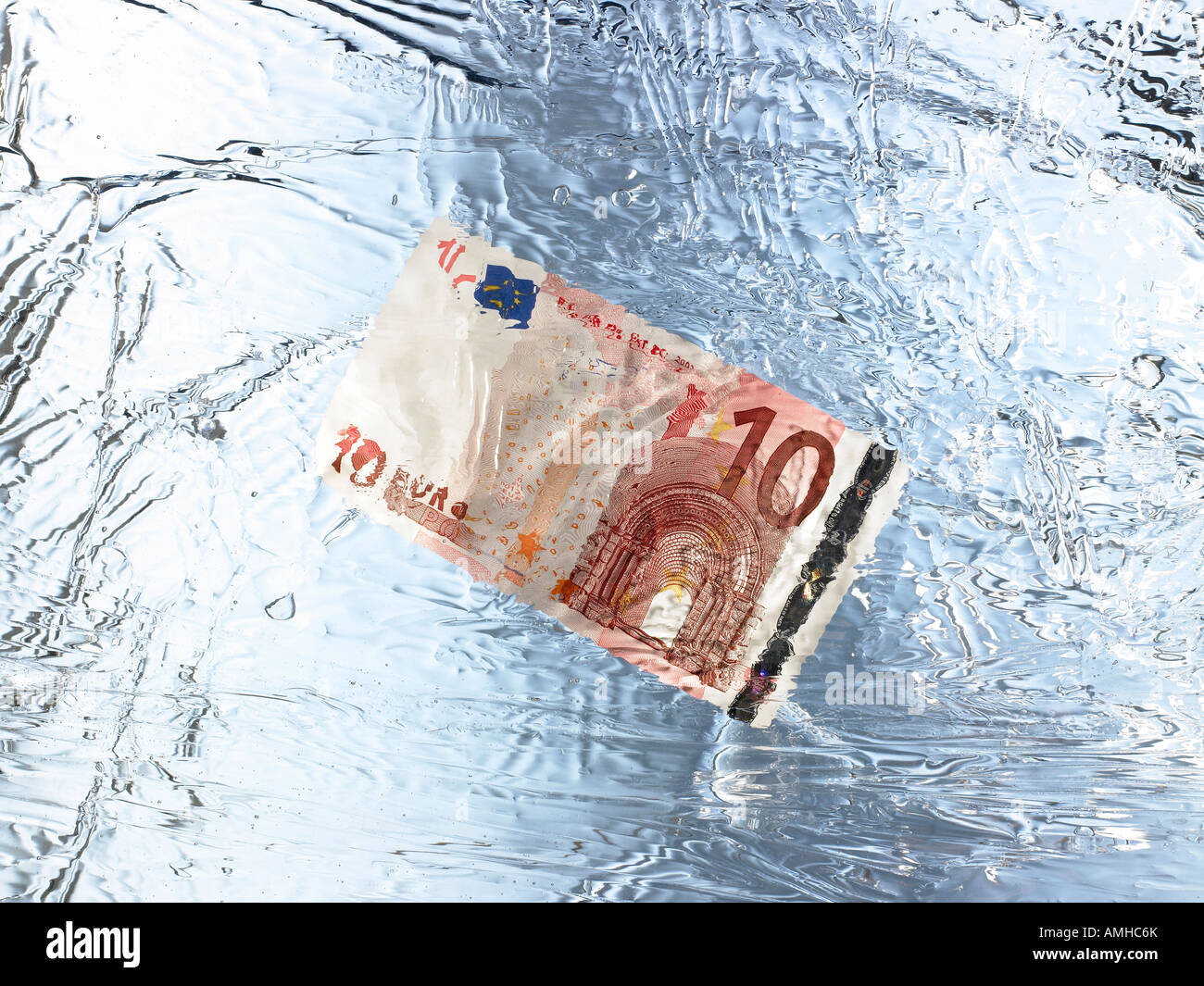 10 Euro note encapsulated in Frozen Ice Stock Photo