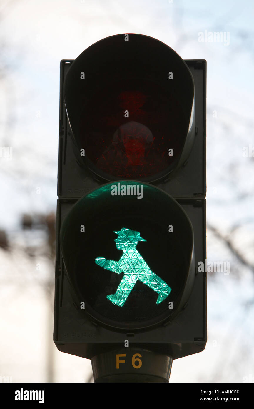 East German Ampelmännchen go walking traffic light man Berlin Germany Stock Photo
