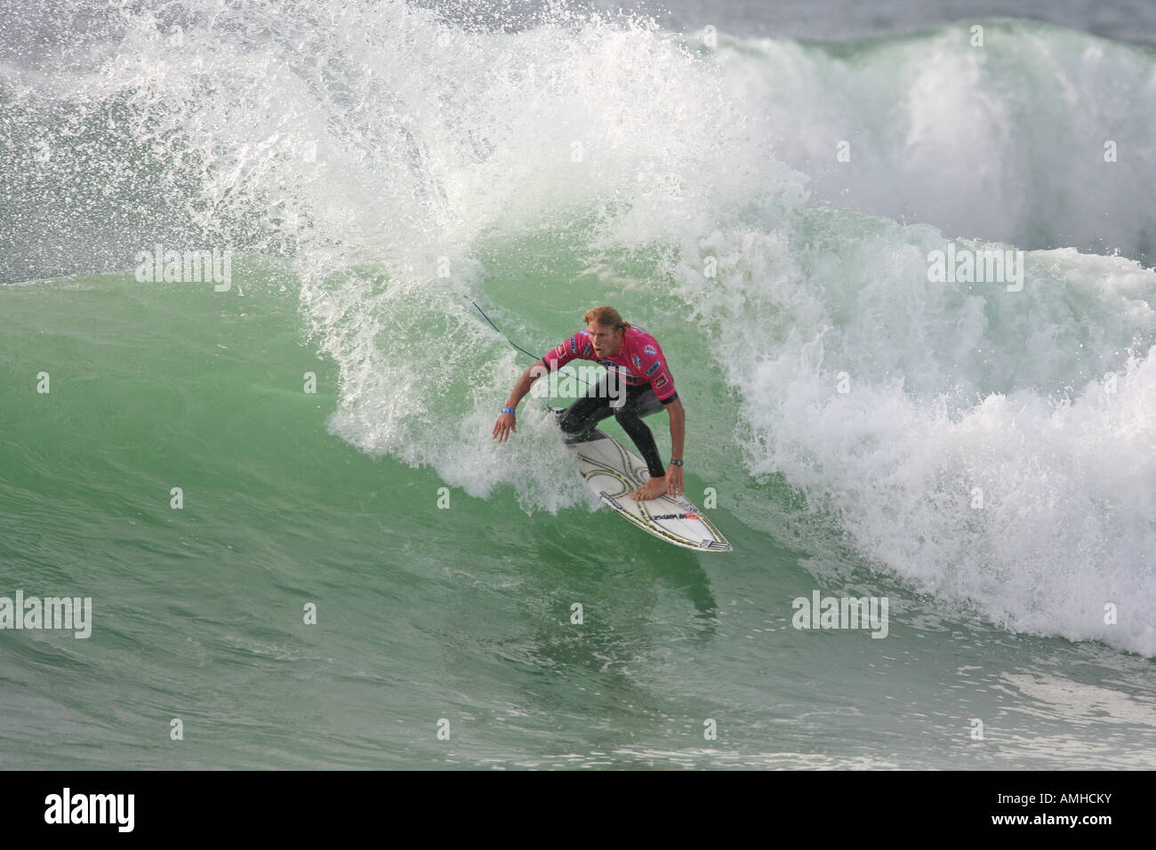 A Surfer rides a Wave Stock Photo - Alamy