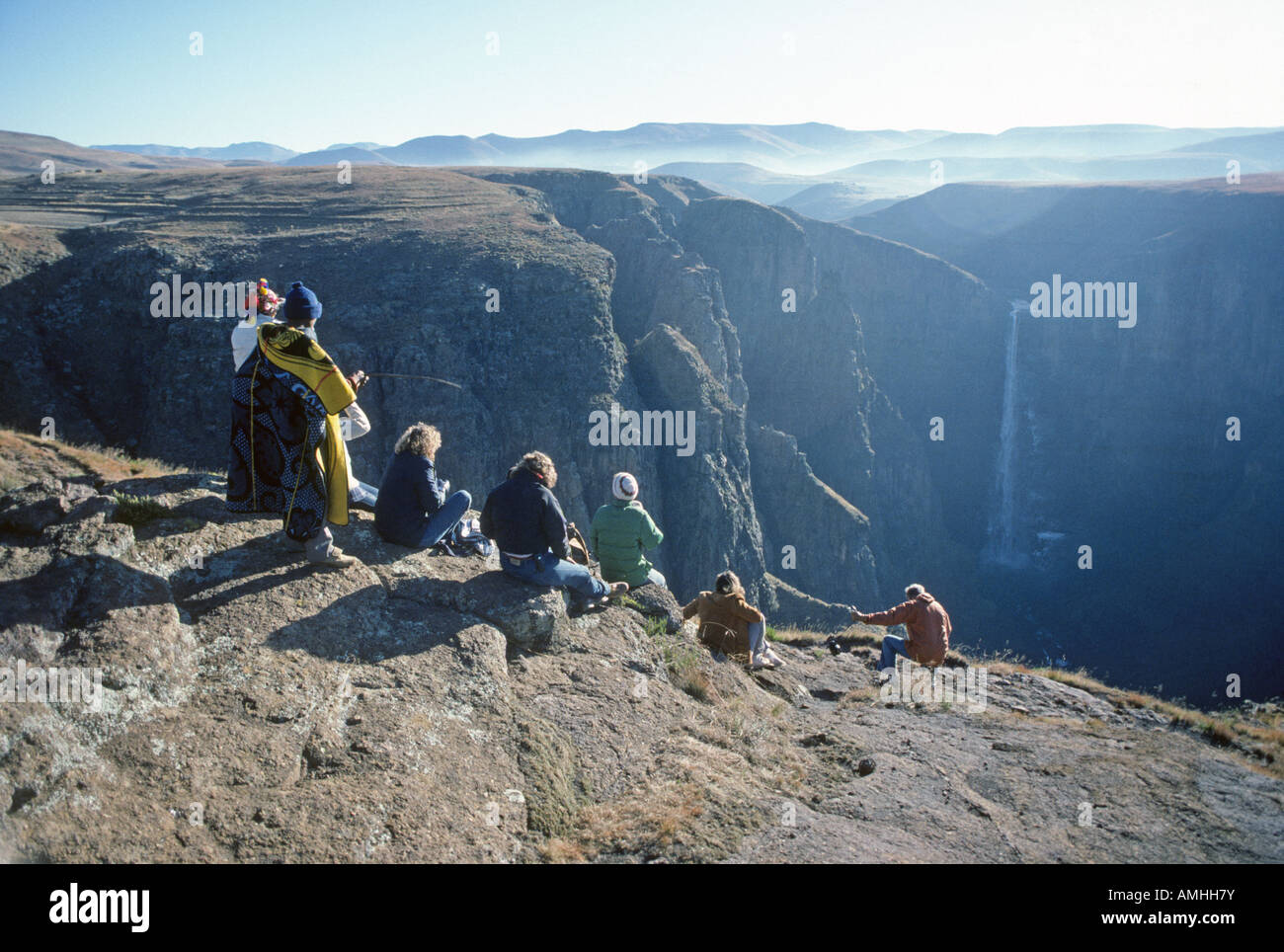 Visitors on horseback visit an overview of Maletsunyane Falls highest