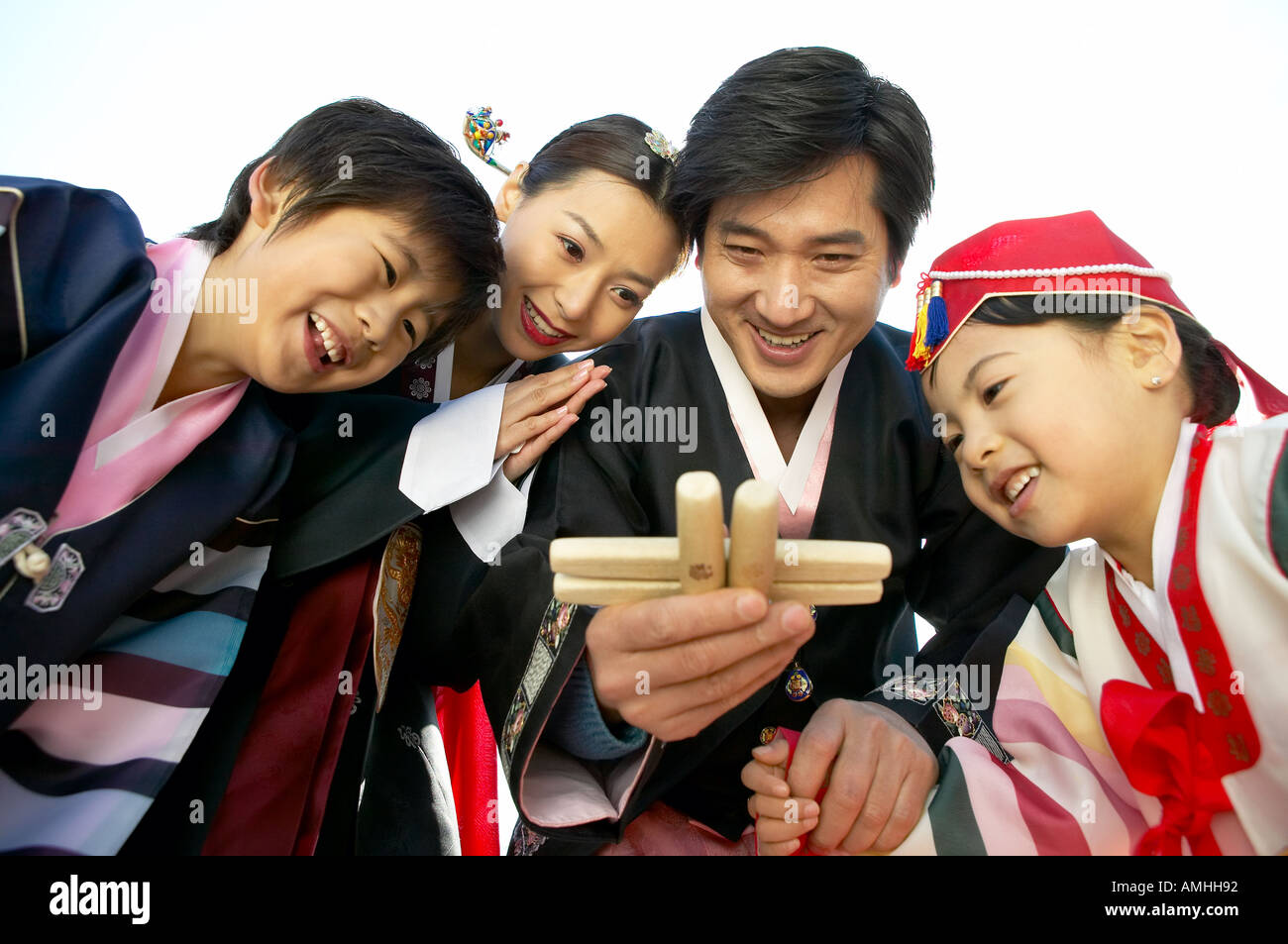 Family playing Korean traditional game Stock Photo Alamy