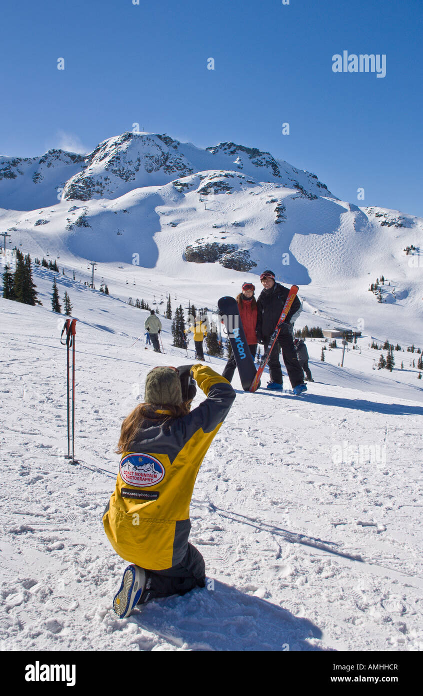 Couple at Whistler Ski Resort having their picture taken British Columbia Canada Stock Photo