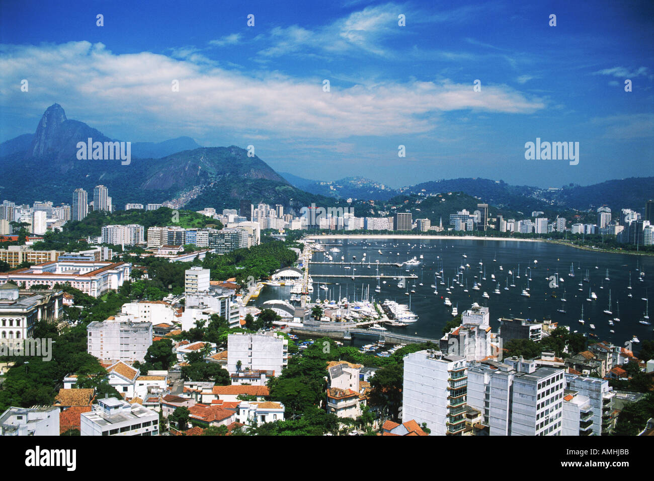 Beach and boats at Bay of Botafogo in Rio de Janeiro with Corcovado Mountain Stock Photo