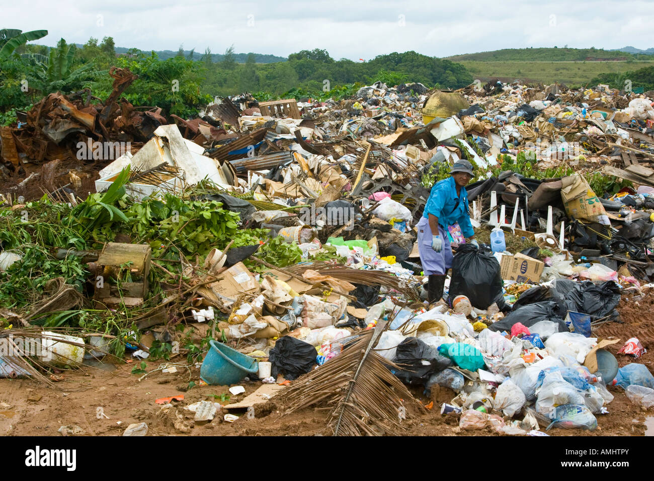 Poor Man Scavanging through a Garbage Dump on Palau Island Stock Photo Alamy