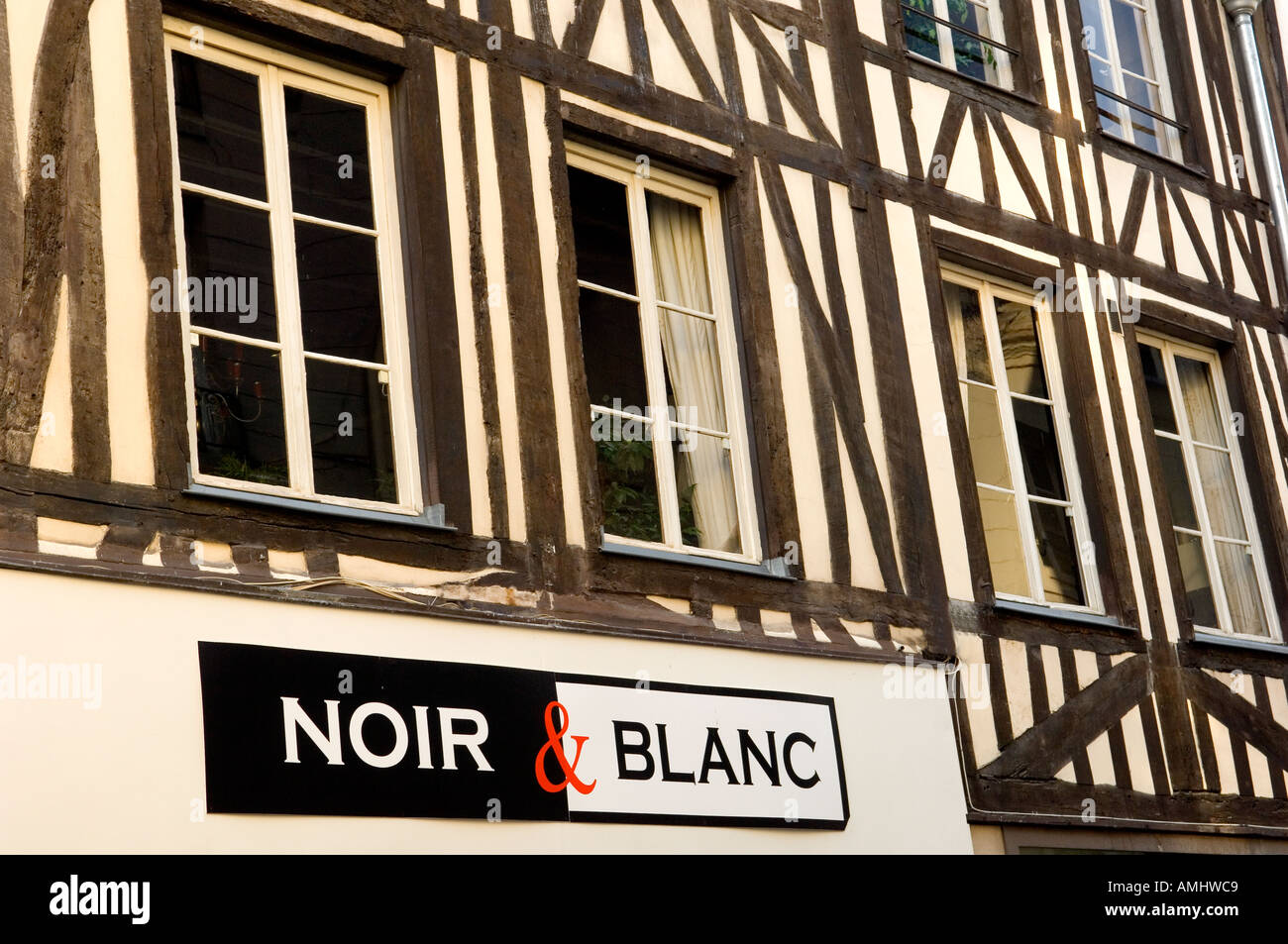Noir et Blanc sign on black and white half timbered buildings at Rouen in Normandy France Stock Photo